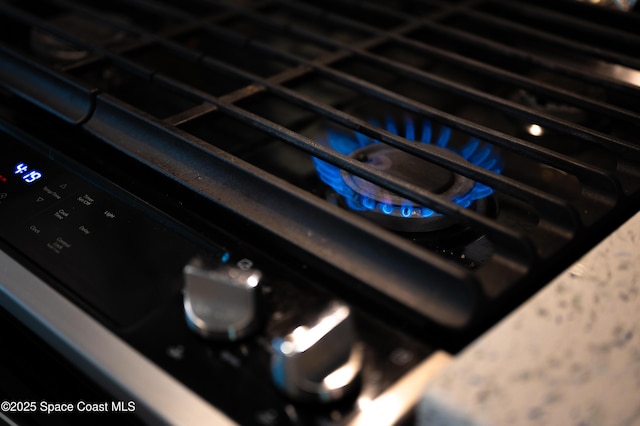 room details with cooktop and gas stove