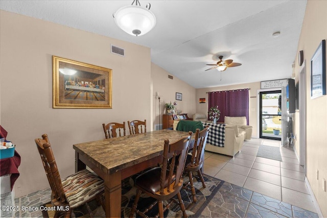 dining room featuring ceiling fan and tile patterned floors