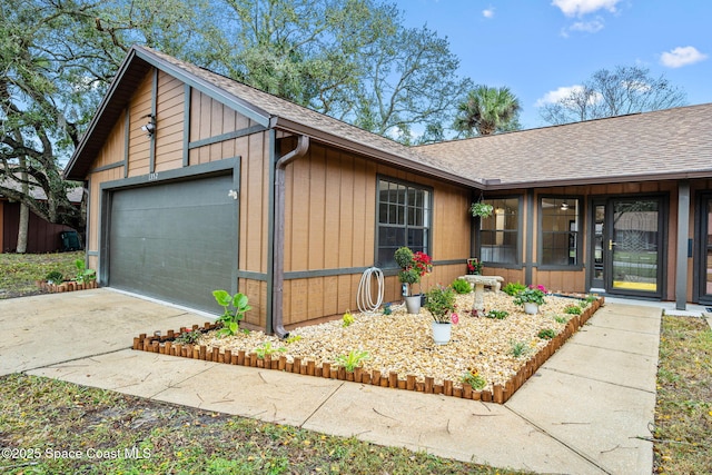 ranch-style home featuring a garage