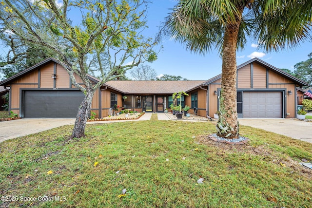 single story home with a garage and a front yard