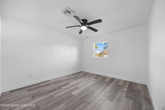 unfurnished room featuring ceiling fan and light hardwood / wood-style flooring