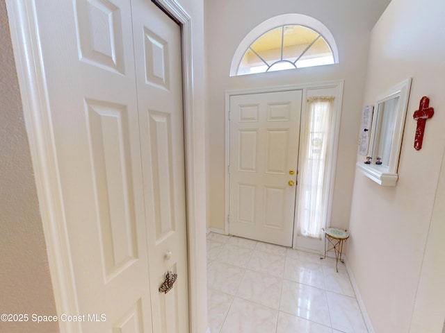 view of tiled foyer entrance