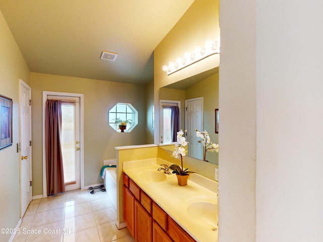 bathroom with vanity and tile patterned floors