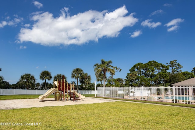 view of jungle gym featuring a yard