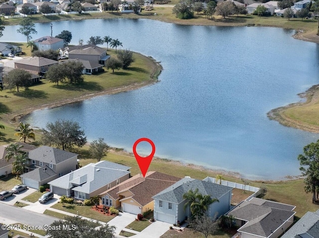 drone / aerial view featuring a water view