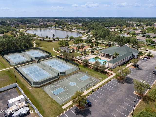 drone / aerial view with a water view