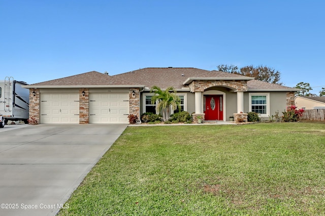 ranch-style home with a garage and a front yard