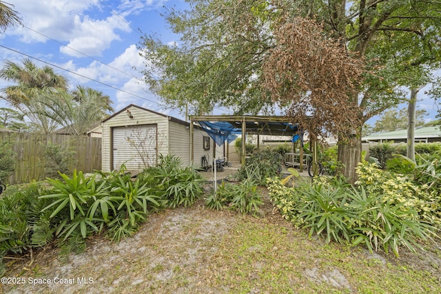 view of yard featuring a storage unit