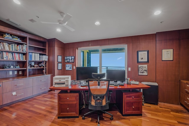 office area with ceiling fan, lofted ceiling, and light hardwood / wood-style flooring