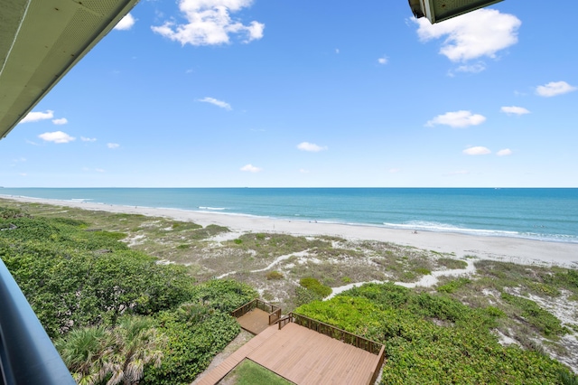 view of water feature with a beach view