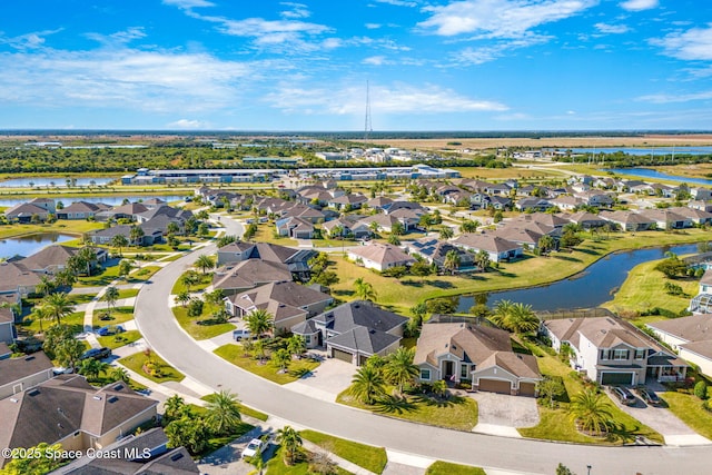 drone / aerial view with a water view