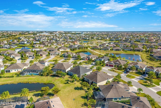 drone / aerial view featuring a water view