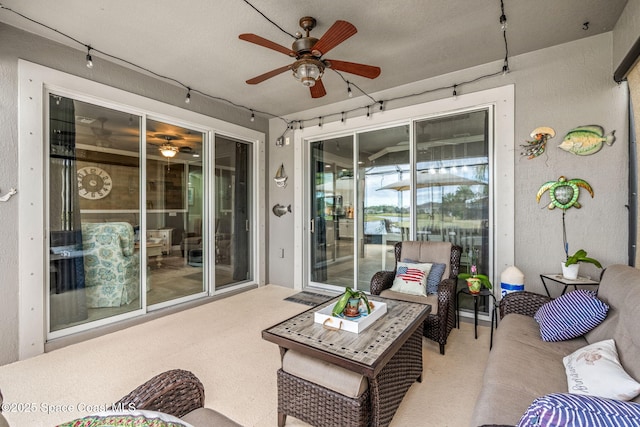 view of patio / terrace featuring ceiling fan