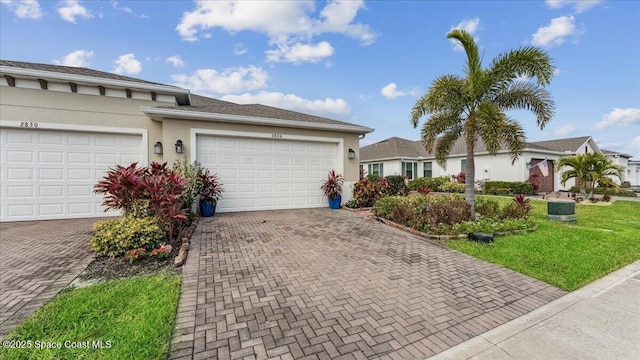 single story home featuring a garage