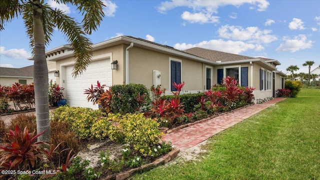 view of property exterior with a garage and a yard