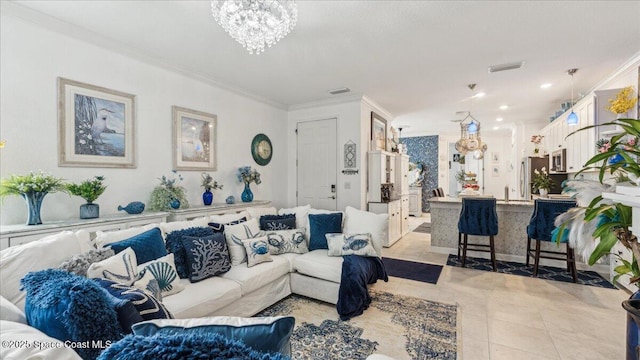 tiled living room with crown molding and a notable chandelier