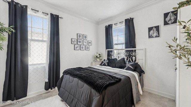 bedroom with ornamental molding