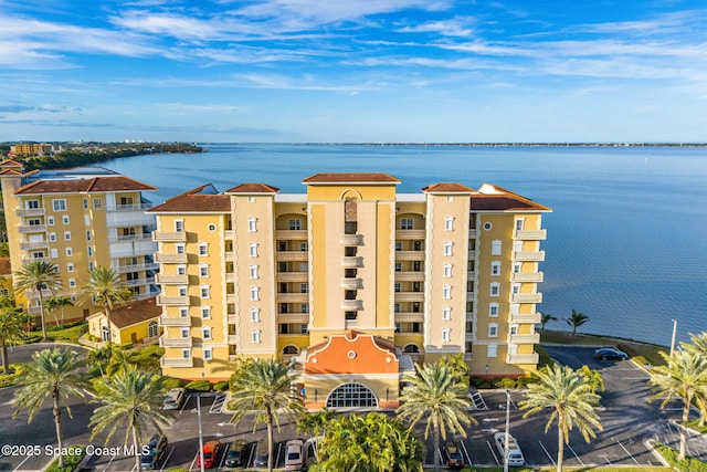 view of building exterior with a water view