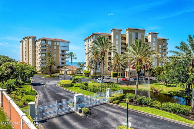 view of property with a water view