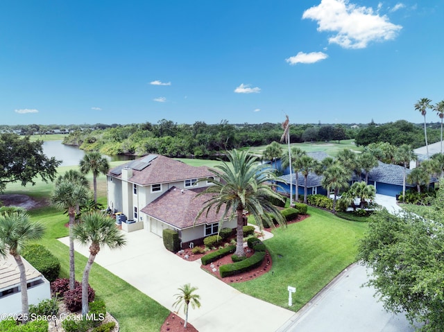 bird's eye view with a water view