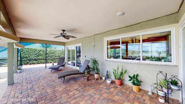 view of patio with ceiling fan