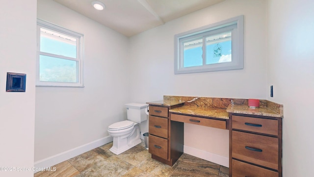 bathroom featuring toilet