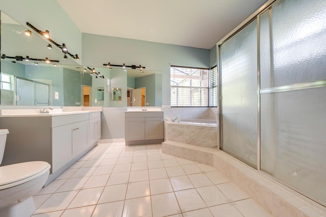 full bathroom with plus walk in shower, vanity, toilet, and tile patterned flooring