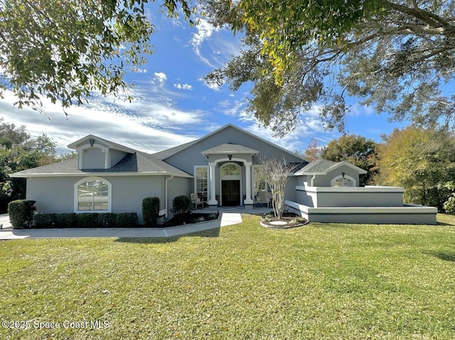 view of front facade with a front lawn