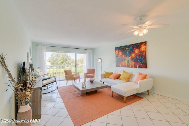 tiled living room with ceiling fan