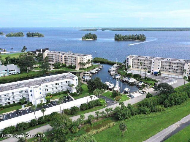 birds eye view of property featuring a water view