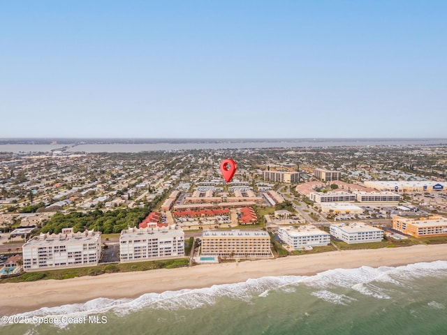 aerial view featuring a beach view and a water view