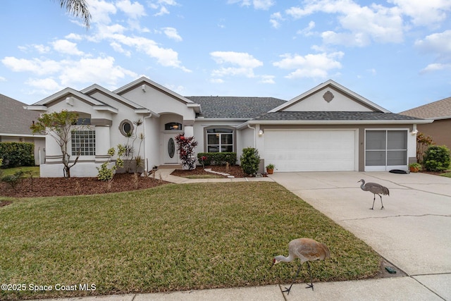 ranch-style home with a front yard and a garage