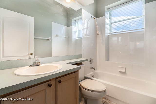 full bathroom with toilet, vanity, and shower / bathtub combination