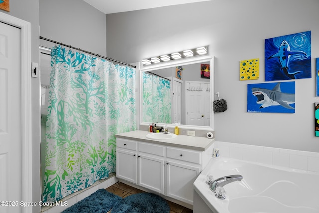 bathroom with vanity, tile patterned flooring, and plus walk in shower