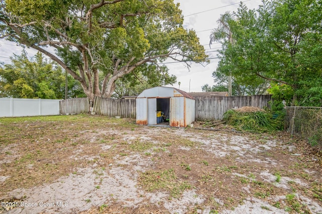 view of yard with a storage shed