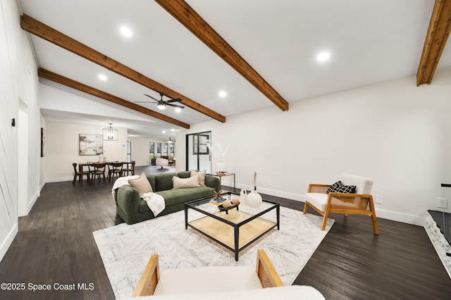 living room featuring dark wood-type flooring, lofted ceiling with beams, and ceiling fan