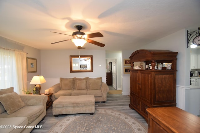 living room featuring ceiling fan