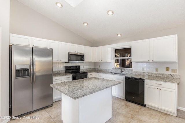 kitchen featuring black appliances, a center island, white cabinetry, tasteful backsplash, and sink