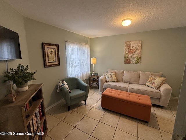 tiled living room with a textured ceiling