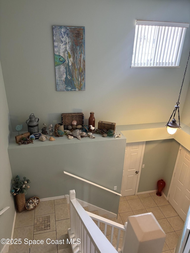 interior space featuring light tile patterned flooring