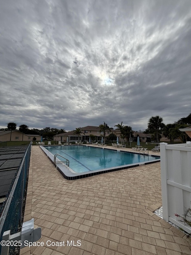 view of pool featuring a patio area