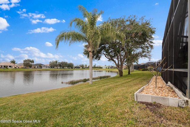 view of yard with a water view