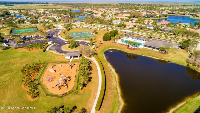 drone / aerial view featuring a water view