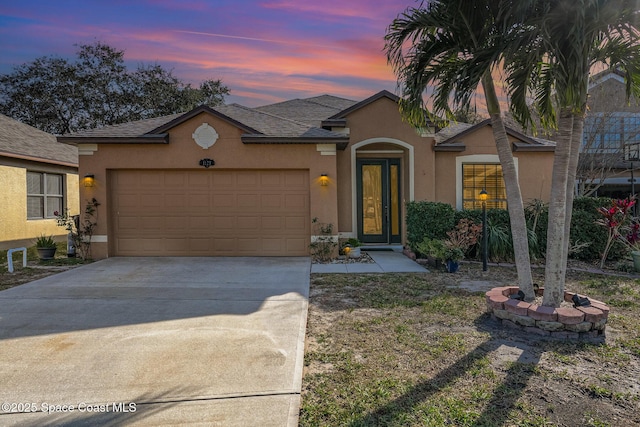 single story home with a garage