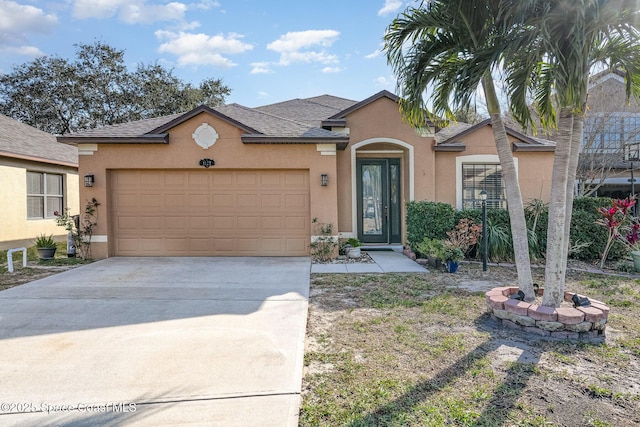 single story home with a garage