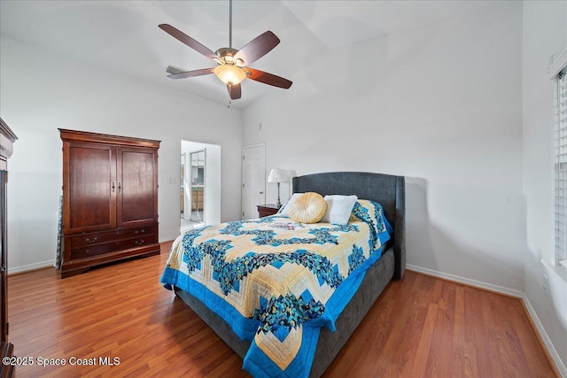 bedroom featuring wood-type flooring and ceiling fan