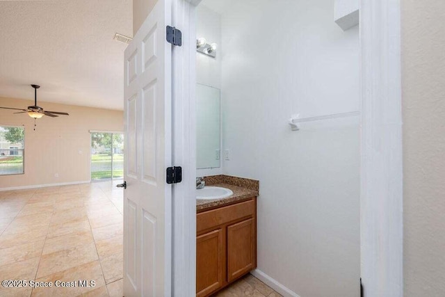 bathroom featuring vanity and ceiling fan