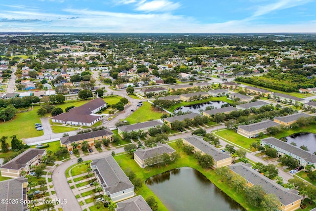 drone / aerial view featuring a water view