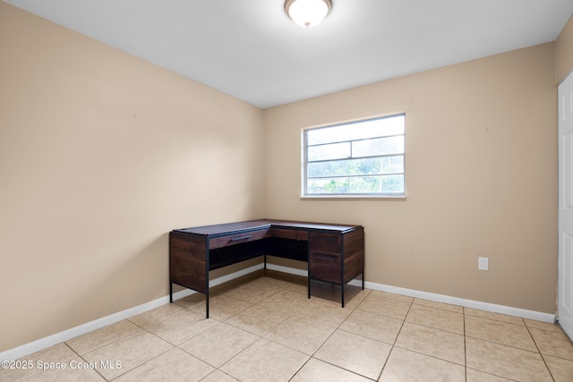 office area featuring light tile patterned flooring