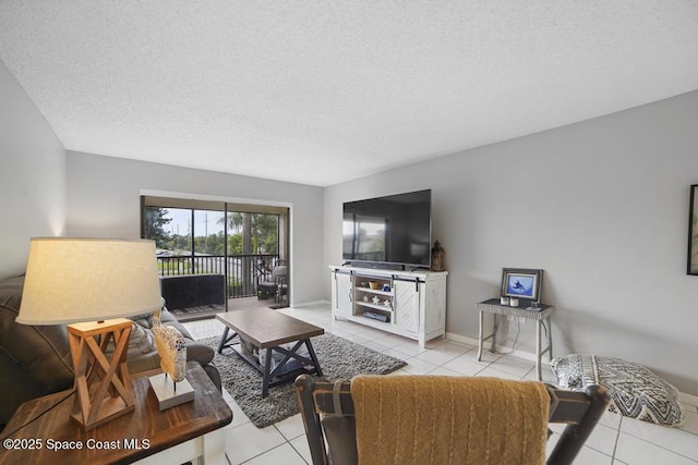 tiled living room with a textured ceiling